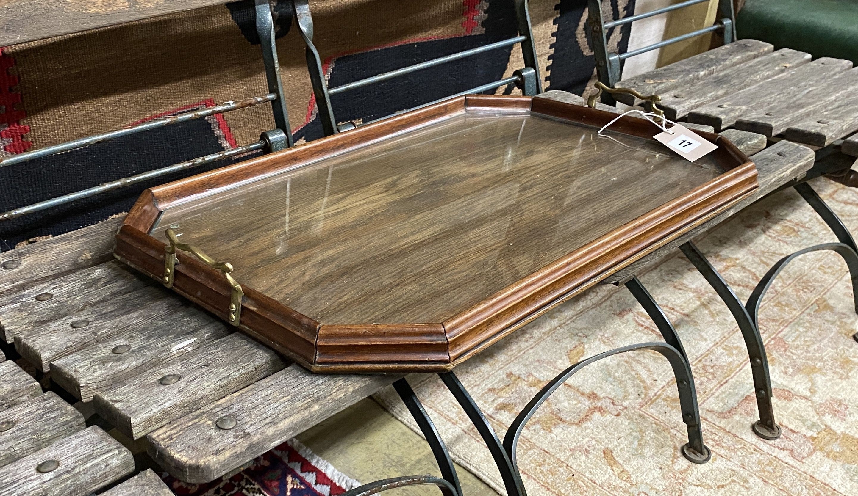 An Edwardian octagonal oak twin handled tray, length 62cm, depth 40cm